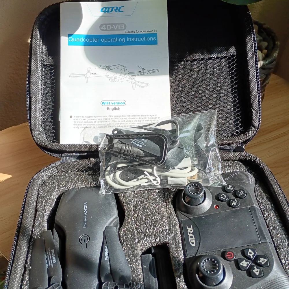 Black Drone with Controller and Accessories